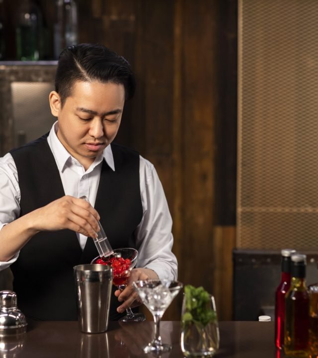 medium-shot-man-preparing-drink